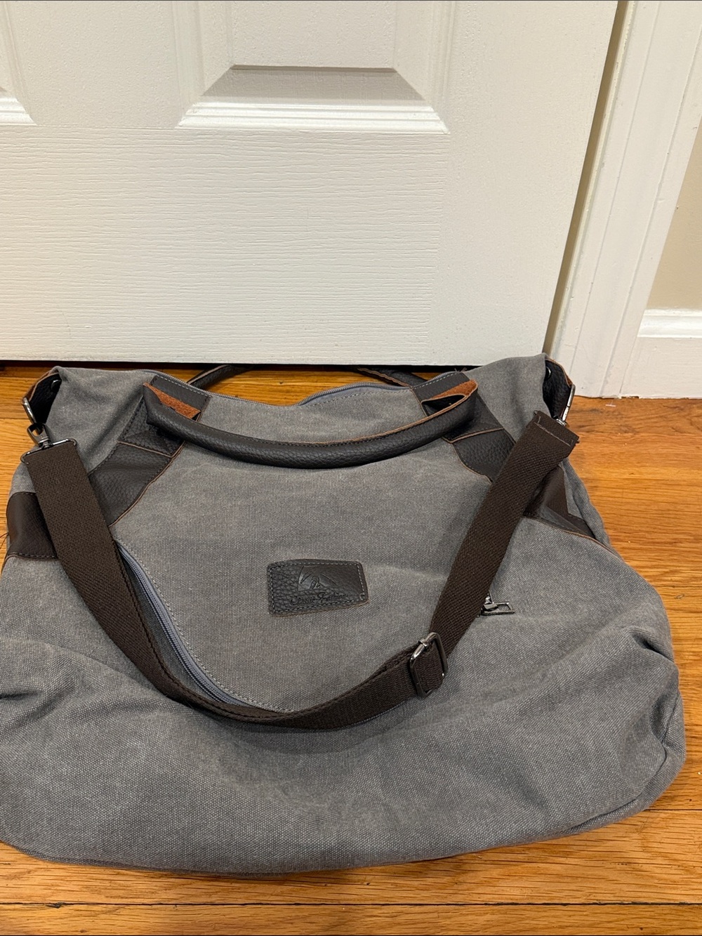 Men's Gray Canvas Duffel with Dark Brown Straps and Accents